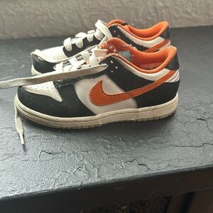 Orange and black October dunks